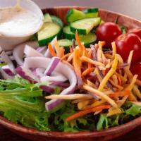 Small Garden Salad · Mixed greens, grape tomatoes, shredded carrot, cucumbers and red onion. Choose your dressing.