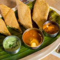 Udupi Special Spring Dosa · Thin rice crepe with a layer of medium spicy chutney, layered with vegetables and potato mas...