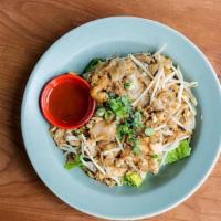 Guay Tiew Kua Gai · flat rice noodles, chicken, egg, sprouts, scallions, salted radish, romaine. substitute praw...