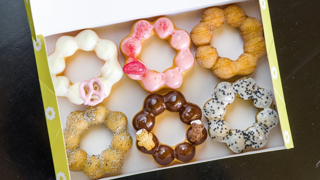 Half Dozen Donuts (6 Donuts) · Assorted flavors of the day