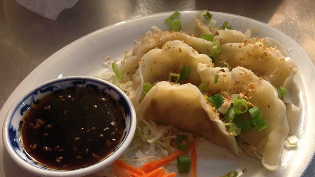 Steamed Pot Stickers (7) · Steamed chicken dumplings served with spicy sweet soy sauce.