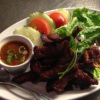 Beef Jerky · Deep-fried marinated beef served with spicy dipping sauce.
