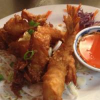 Fried Shrimp (6) · Deep-fried battered shrimp served with sweet and sour sauce.