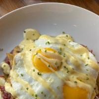 Corned Beef Hash · Prepared with German fried potatoes
tossed in hash sauce, sautéed green
and red peppers, oni...