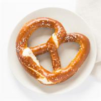 Pretzel Fondue · Our classic fondue served with a traditional
Bavarian pretzel.