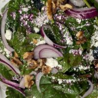 Spinach And Steak · Fresh spinach, bistro tender, local goat cheese, toasted walnuts, blueberries, red onion, ko...