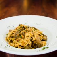 Short Rib Stroganoff · Slow-braised short rib, simmered in a stew of vegetables, mushrooms, sour cream, a hint of d...