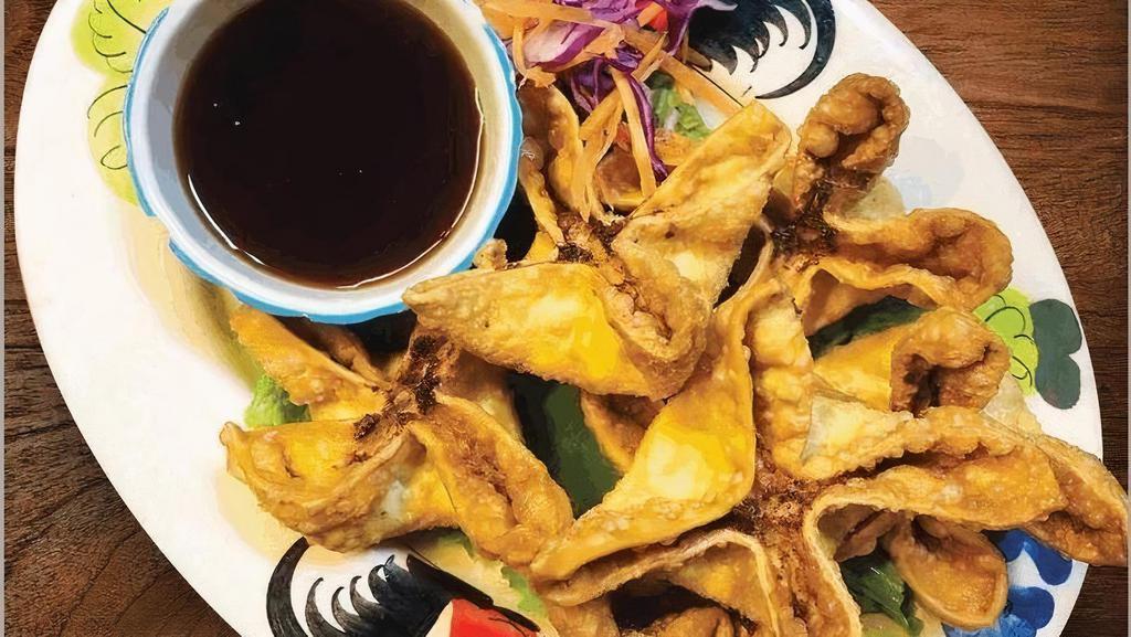 Crab Wonton · Fried wontons stuffed with cream cheese and scallions' Served with a side of sweet & sour sauce.