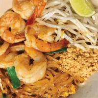 Pad Thai · Thin rice noodles stir-fried with egg, scallions, and bean sprouts. Topped with crushed pean...
