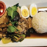 Khao Kha Moo · served with steamed rice Slow-cooked stewed pork, hard boiled egg, shiitake mushrooms, chine...