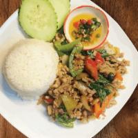 Pad Khaprow Mhoo Krob · served with steamed rice Thai-style stir fry with crispy pork belly, basil, bell peppers, on...