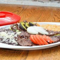 Carne Asada Plate · Carne asada (beef) or pollo asado (grilled chicken), black beans, Mexican rice, sliced onion...