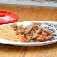 Fajita Plate · Fajita style veggies with choice of meat, tofu, or just veggies served with black beans, Mex...