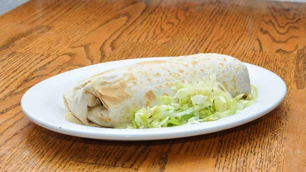 Burrito · Large flour tortilla filled with choice of chicken, steak, pork, or tofu (tofu is fajita style only), black beans, Mexican rice, sour cream, and fresh chunky salsa.