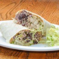 Fish Burrito · Large flour tortilla filled with white fish sauteed in a tomatillo salsa, shredded cabbage, ...