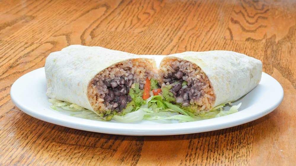 Carrots, Broccoli & Cauliflower Burrito · Large flour tortilla filled with black beans, rice, the veggies, guacamole, and sour cream. make it wet for an additional charge.