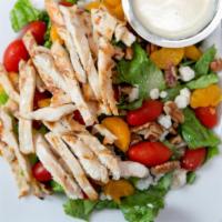La Parrilla Suiza Salad · Green leaf lettuce, tossed in dressing with chopped bacon, cherry tomatoes, bleu cheese, tan...
