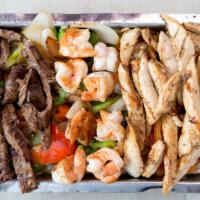 Trio Fajitas · Marinated charbroiled selection of chicken, beef, or shrimp with bell peppers, onions, serve...