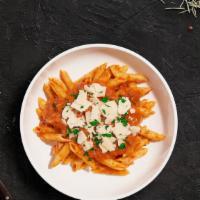 Drunk On The Vodka-Sauce  · (Vegetarian) Fresh Cavatappi pasta cooked in a pink vodka sauce and topped with parmesan, pa...