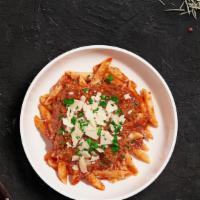 Ballin' Bolognese Pasta · Fresh Cavatappi pasta cooked in a meaty red sauce and topped with black pepper, parsley, and...