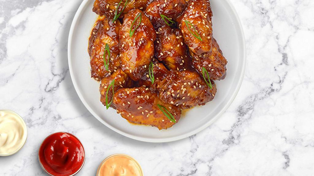 Sweet Teriyaki Wings · Fresh chicken wings breaded, fried until golden brown, and tossed in teriyaki sauce. Served with a side of ranch or bleu cheese.