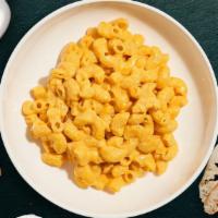 The Classic Mac · Traditional rich and creamy mac and cheese with macaroni pasta.