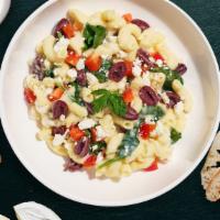 Terra Mac  · Fresh diced tomatoes, olives, goat cheese, feta, and spinach cooked in a blend of creamy che...