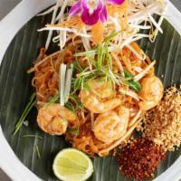 Pad Thai · Spicy. Sautéed rice noodles with scallion, egg, sweet pickled radish & bean sprouts, served ...