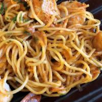 Spaghetti Frutti Di Mare · Fresh salmon, shrimp, and sea scallops sautéed in a spicy garlic tomato wine sauce.