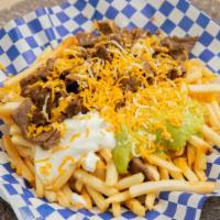 Carne Asada Fries · Carne asada, sour cream, guacamole and cheese.