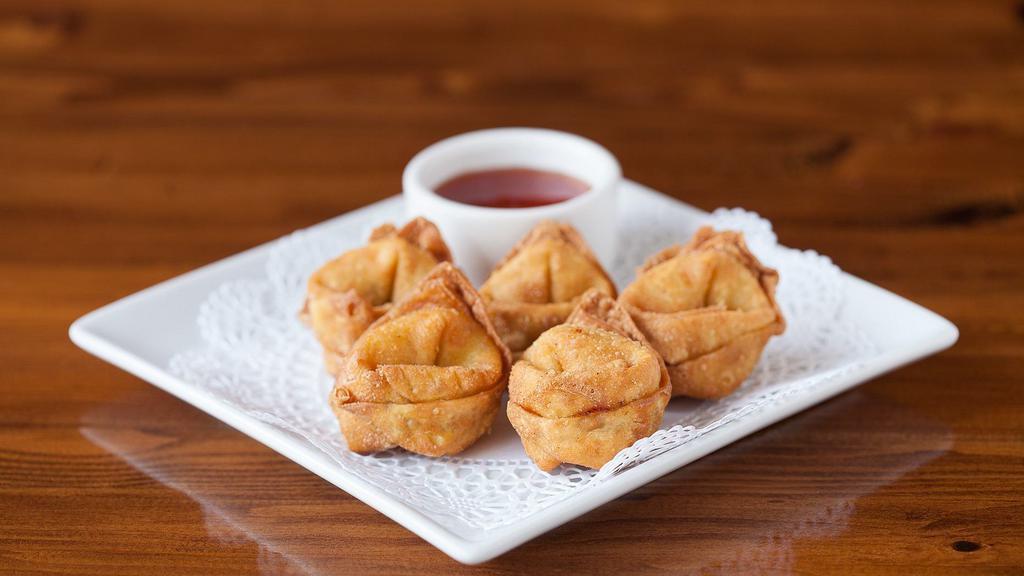 Cream Cheese Puffs · Seasoned cream cheese wrapped in thin pastry and fried to perfection, served with plum dipping sauce.