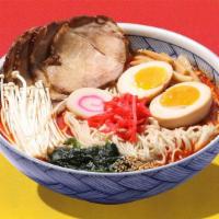 Spicy Shoyu Pork Ramen · Spicy soy broth with noodles and sliced pork.