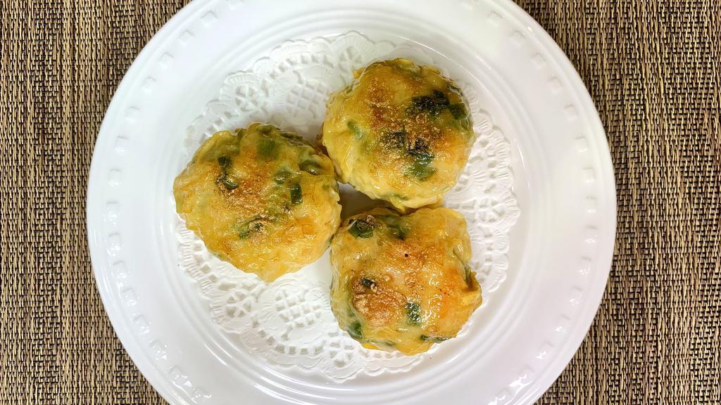 Pan Fried Shrimp Leek Dumpling(3Pcs)煎鲜虾韭菜饼 · These perfectly wrapped dumplings filled with shrimp and chives are a quick fix when you need shrimp and dumplings