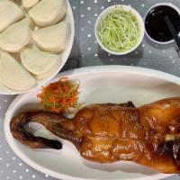 Peking Duck北京鴨(鸭松) · Consisting of pieces of tender, roasted duck meat and crispy skin wrapped in steamed pancake...