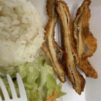 Katsu Chicken · Chicken Breast breaded in Panko crumbs and deep-fried, cut into strips. Rice & Salad. Katsu ...