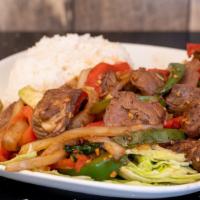 Shaking Beef · Sautéed steak cubes with cucumber, lettuce, onions and pepper.