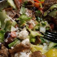 Gyro Salad · Romaine and iceberg lettuce topped with feta cheese, pepperoncinis, kalamata olives, onions,...
