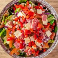 House Chopped Salad · Choice of iceberg, romaine or spinach plus tomato, red onion, Genoa salami, baby Swiss chees...