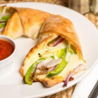 Sausage Roll · Grilled sausage sauteed peppers & onions with melted mozzarella cheese baked in our fresh do...
