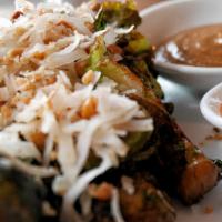 Egyptian Style Brussels Sprouts  · Crispy Fried Brussel Sprouts topped with Pumpkinseed  and Almond Dukkah &  Pomegranate Molas...