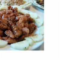 Sesame Chicken · Crispy chicken sautéed in a special brown sauce and served with sesame seeds on top.