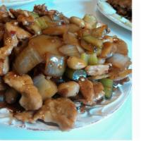 Kung Pao Chicken · Spicy. Chicken stir-fried in a spicy sauce, with black chili, golden peanuts, celery and oni...
