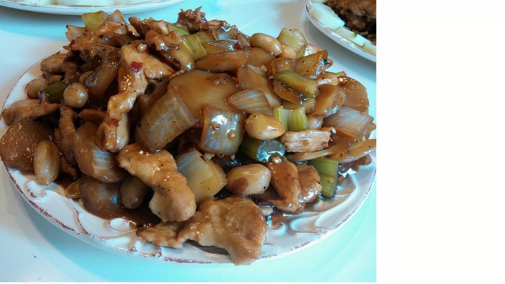 Kung Pao Chicken · Spicy. Chicken stir-fried in a spicy sauce, with black chili, golden peanuts, celery and onions.
