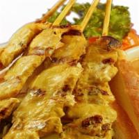Satay (4) · No MSG added. Gluten-free. Grilled marinated chicken strips in coconut milk & curry, served ...