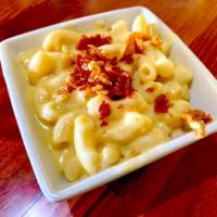 (T) Gouda Mac & Cheese Side · Gouda and cheddar cheeses blended with rich Béchamel, tossed with fresh macaroni, and topped...
