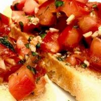 (T) Bruschetta Pomodoro · VEGAN. Chopped Roma tomatoes, fresh garlic, basil, and olive oil, on two toasted, house-made...