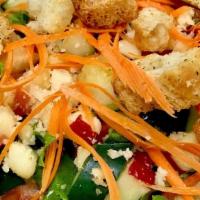 (T) Garden Salad · VEGAN. Mixed greens, tomatoes, cucumbers, carrots, mushrooms, apples, macadamia nuts, and cr...