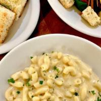 (T) Gouda Mac & Cheese, Salad & Garlic Bread · Gouda and cheddar mixed with Béchamel sauce and macaroni, served with an entree salad and tw...