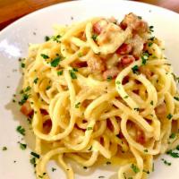 (T) Spaghetti Carbonara · Pasteurized eggs, garlic, pancetta, and Pecorino Romano cheese, tossed with house-made fresh...