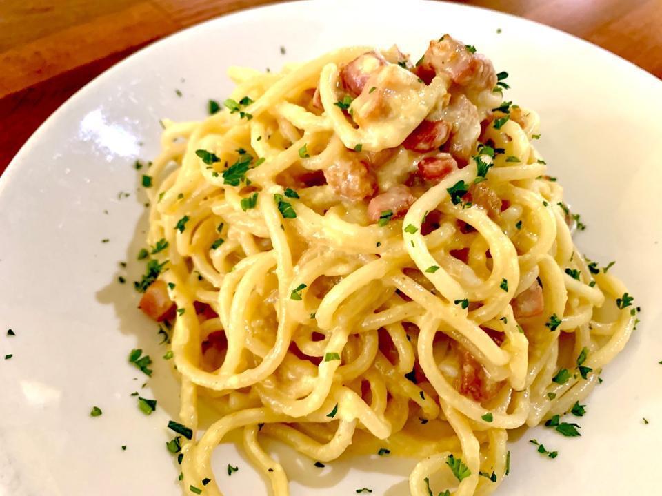 (T) Spaghetti Carbonara · Pasteurized eggs, garlic, pancetta, and Pecorino Romano cheese, tossed with house-made fresh spaghetti.
